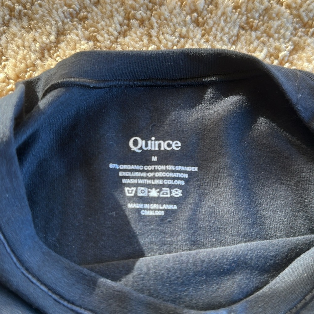 Quince - black short sleeved body suit with thing back and 2 snap closure. - Picture 2 of 3